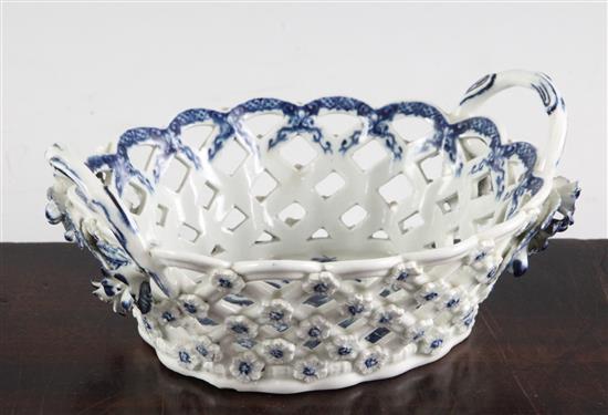 A Worcester Pine Cone pattern oval twin handled basket. c.1775, width 19cm, small losses to flowers